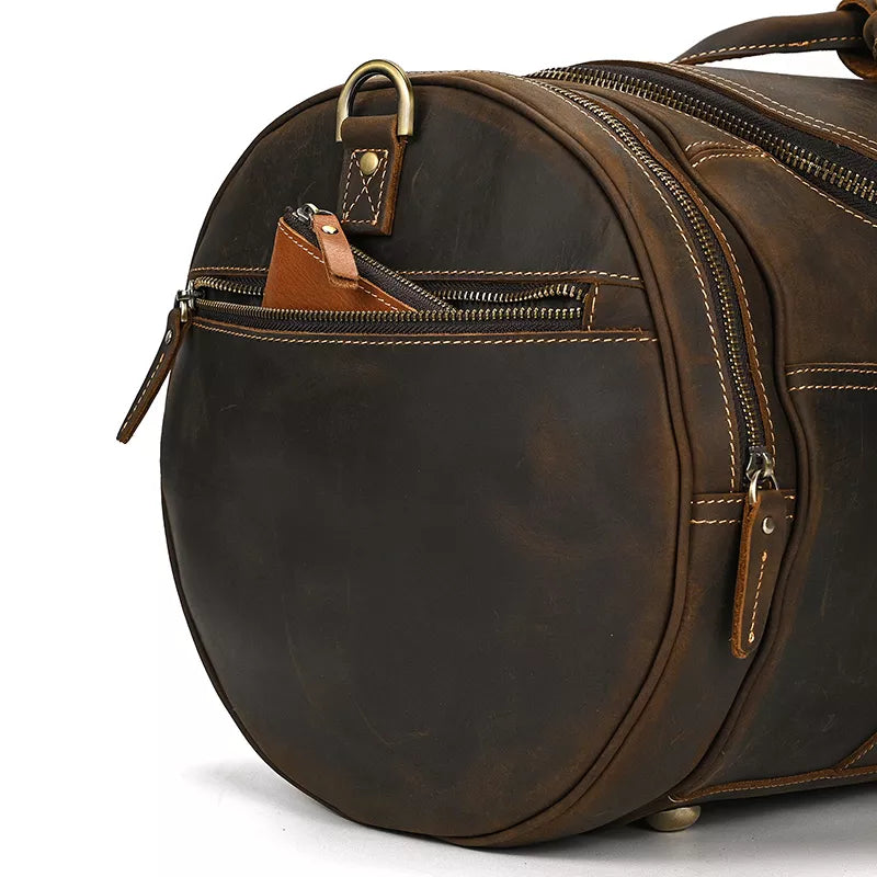 Explore the Warwick Weekender: Timeless Round Vintage Leather Travel Bag