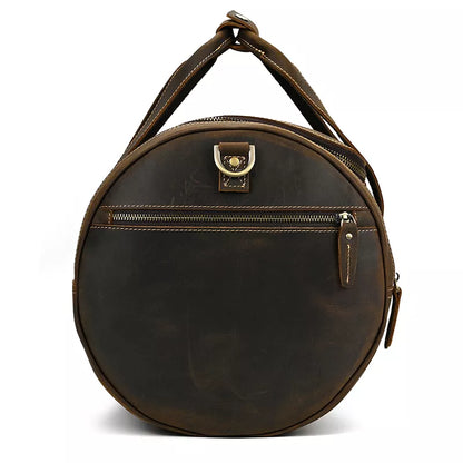 Explore the Warwick Weekender: Timeless Round Vintage Leather Travel Bag