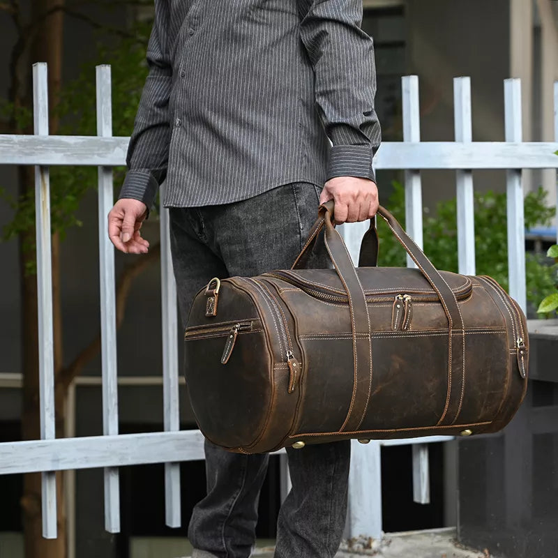 Explore the Warwick Weekender: Timeless Round Vintage Leather Travel Bag