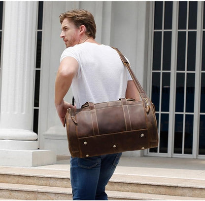 Explore the Warwick Weekender: Timeless Round Vintage Leather Travel Bag