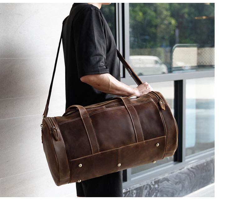 Explore the Warwick Weekender: Timeless Round Vintage Leather Travel Bag